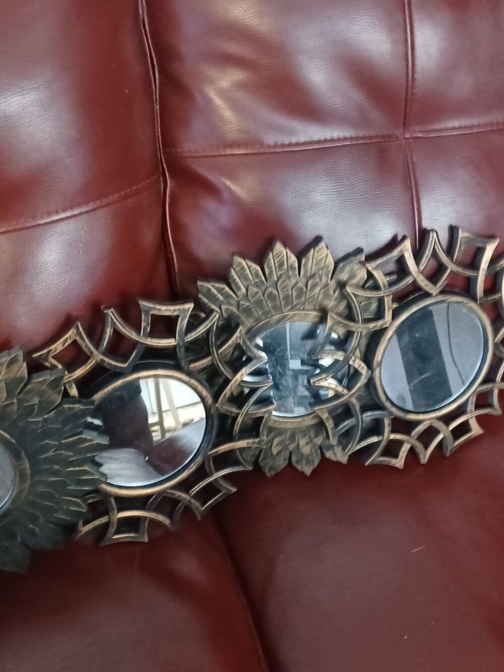 5 small plastic framed circle mirrors